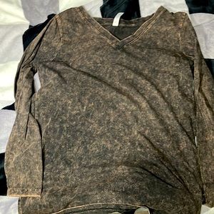 I am selling a long sleeve black bleached shirt made by Zenana Outfitters in 1x